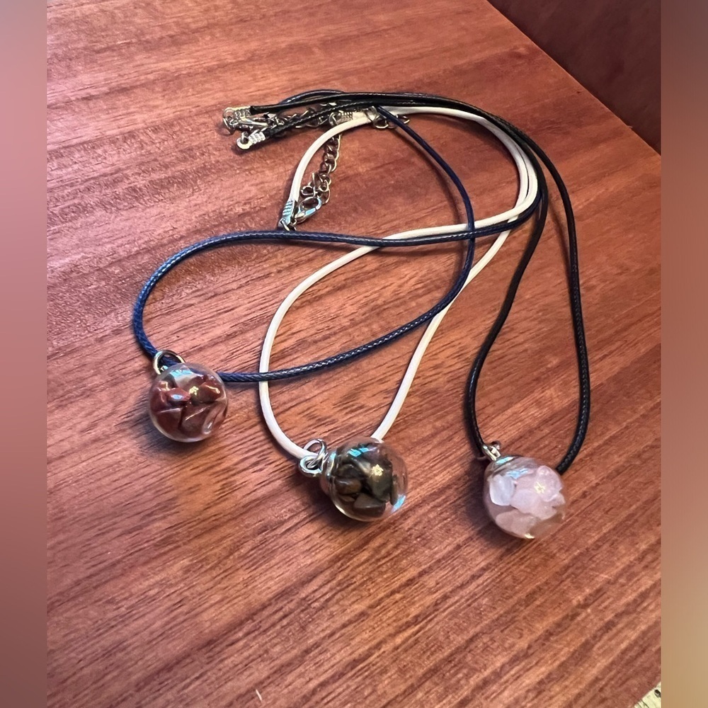 Hand filled glass globe pendants with assorted crystal chips. Set of 3.